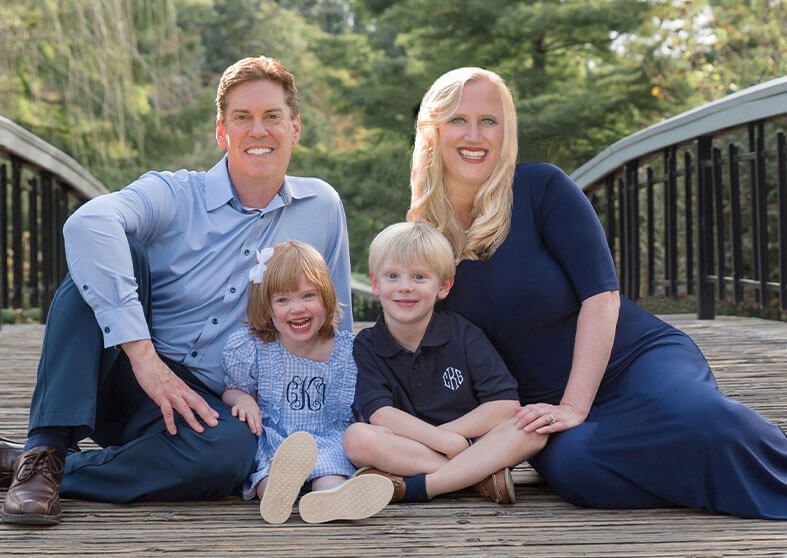 Doctor Koch and his family posing for a Christmas photo