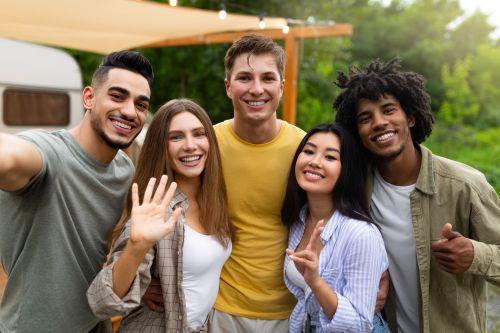 group of five friends outside in backyard | cary dentist